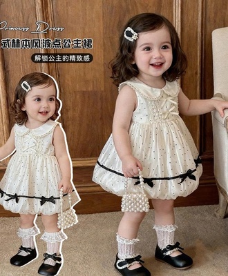 Đầm công chúa trắng chấm bi 1906